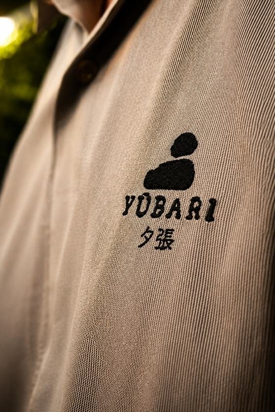 Uniforme da equipe com o bordado Yūbari 夕張