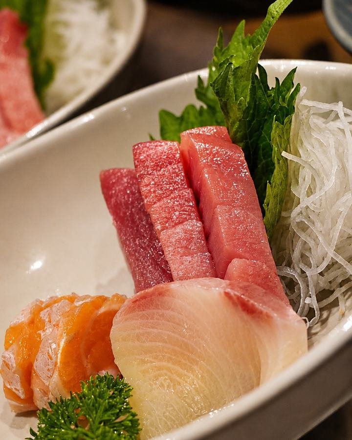 Sashimis de atum bluefin, salmão e hamachi